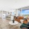 open living concept showing living room and kitchen combined with ample space for seating and modern living room decor