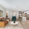 living area that includes ample seating spaces and bright lighting