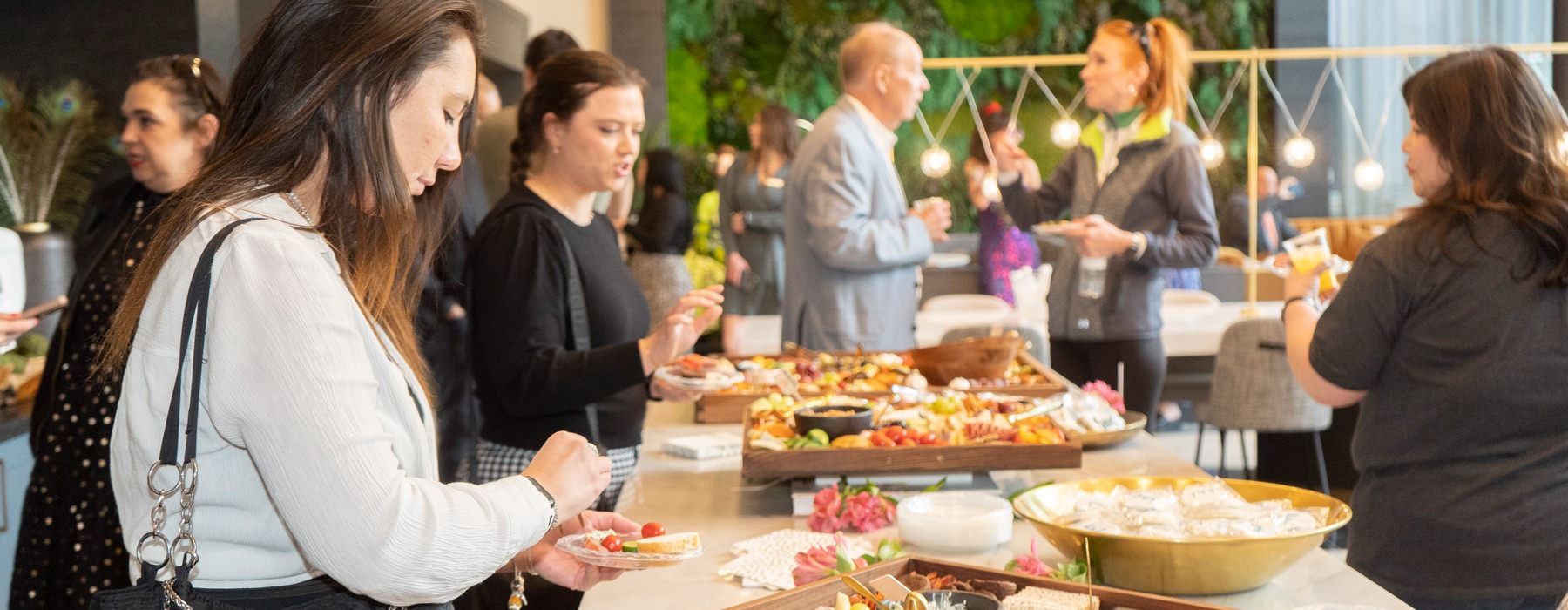 people eating at a buffet